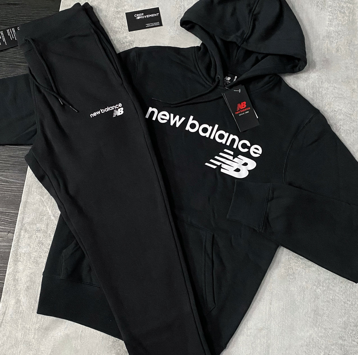 NEW BALANCE ESSENTIAL TRACKSUIT - BLACK